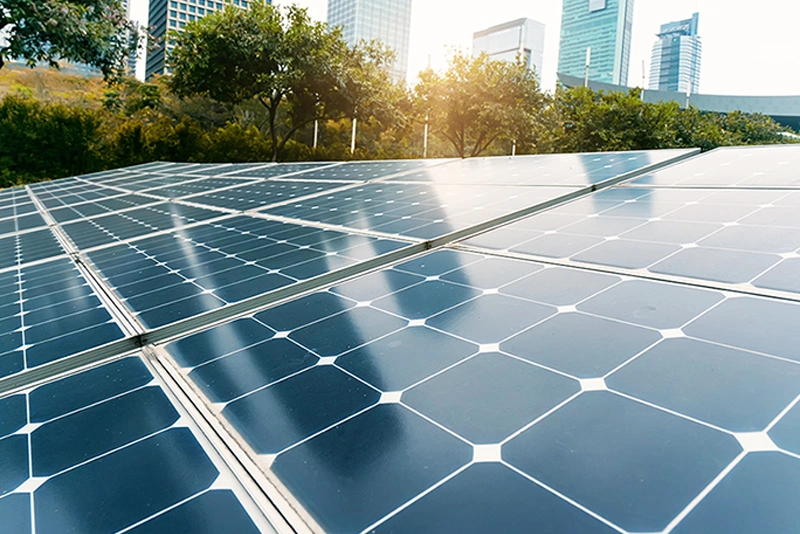 Solar panel array capturing sunlight, backed by VMAX SLR series deep cycle AGM batteries for reliable renewable energy.